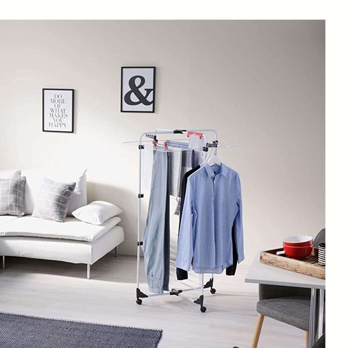 clothes hanging on an indoor tower airer in living room